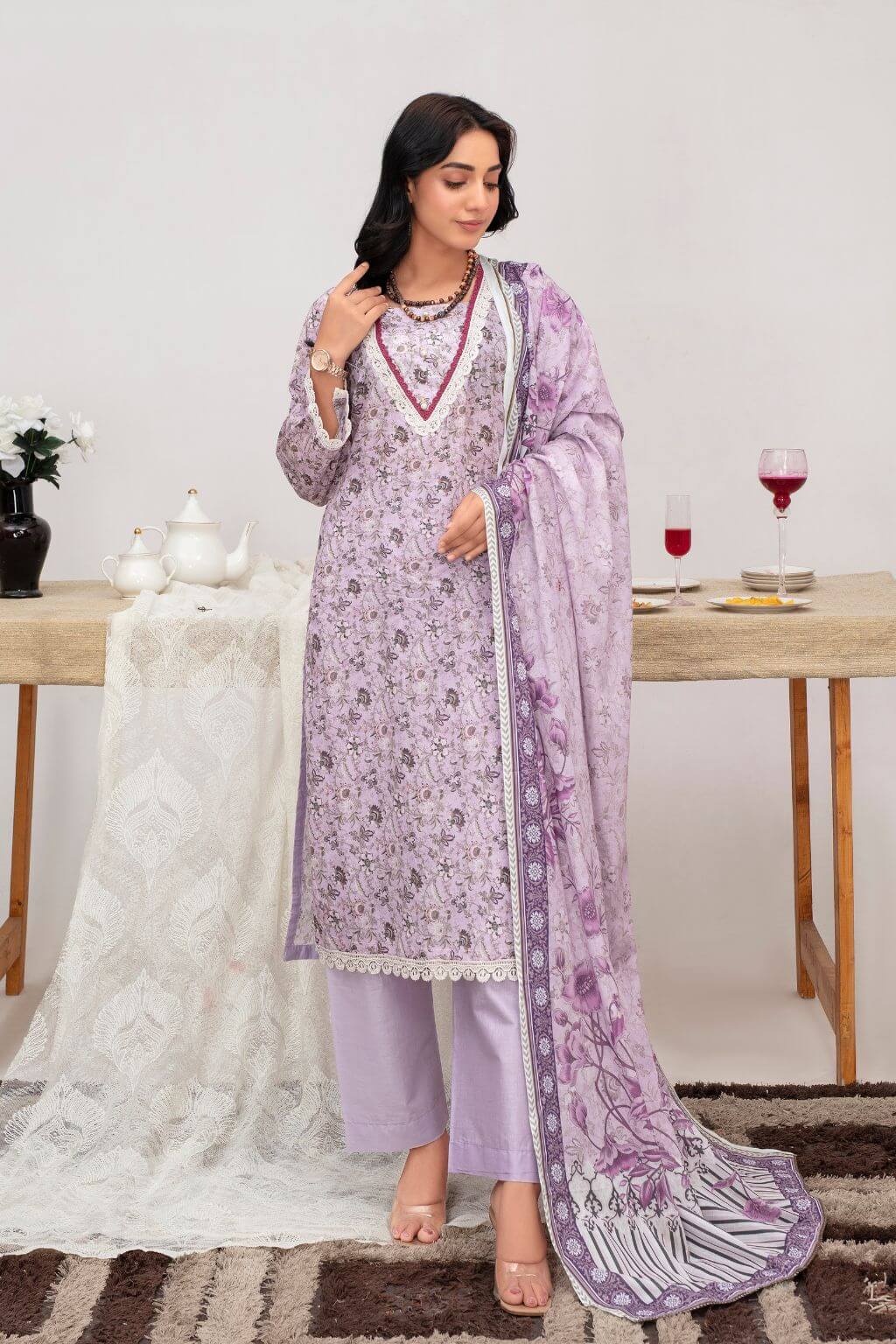 Lavender Bloom lawn 3-piece ready to wear suit with lace shirt, lawn dupatta, and dyed trousers by Nishaq.