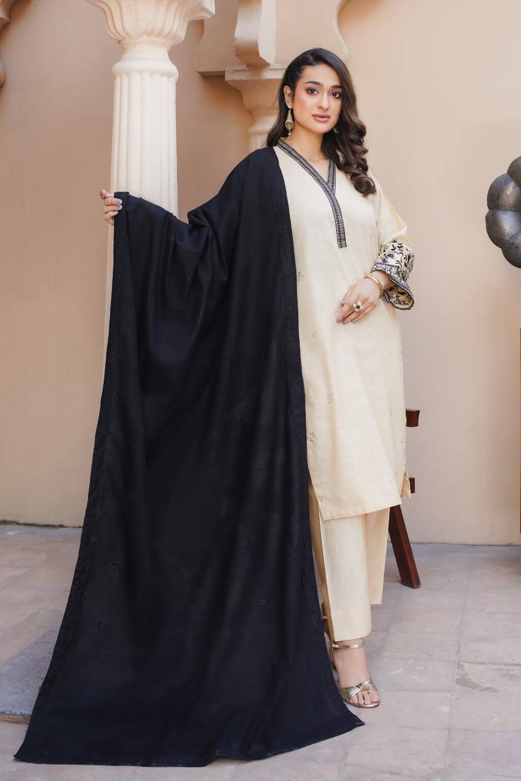 Layla 4 winter khaddar 3-piece suit with embroidered shirt, embroidered dupatta, and plain trousers. Nishaq warm wear.